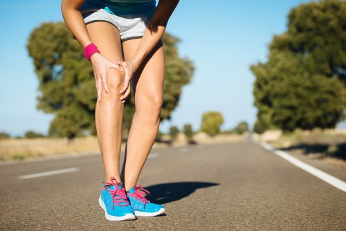 Female,Runner,Knee,Injury,And,Pain.